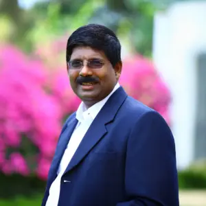 Dr. Prateep V Philip